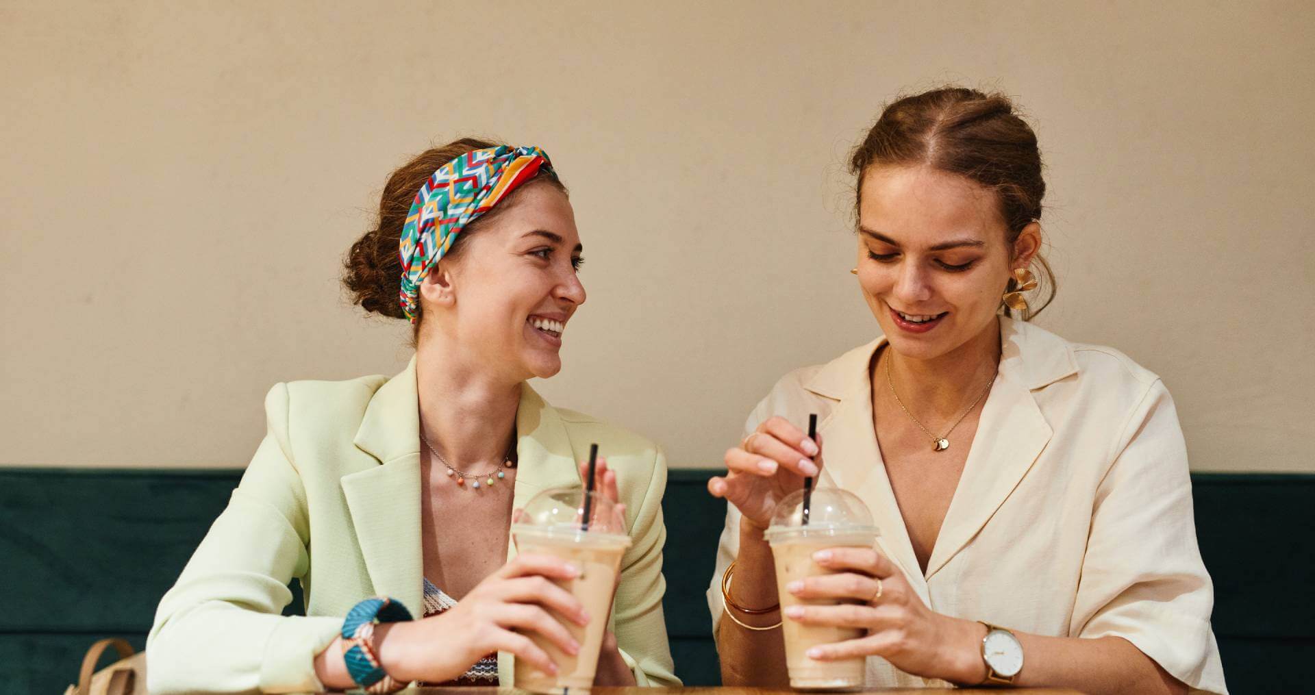 women drinking tea in shop